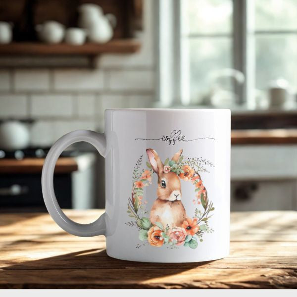 Taza de café con diseño de conejito y frase de amor.