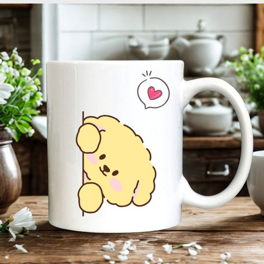 Taza de café con diseño de perrito y corazón.